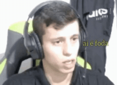 Young Man In Headphones Making Funny Face GIF