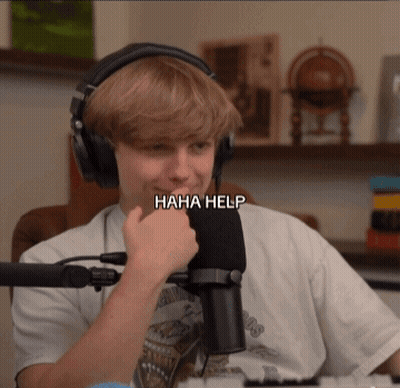 Young Man In Headphones Saying Haha Help GIF