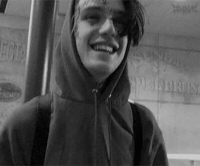 Young Man In Hooded Jacket Smiling GIF