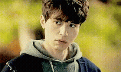 Young Man In Hoodie Close Up GIF