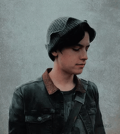 Young Man In Knitted Hat And Denim Jacket GIF