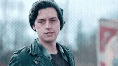 Young Man In Leather Jacket And Beanie GIF