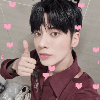 Young Man In Maroon Shirt Giving Thumbs Up GIF