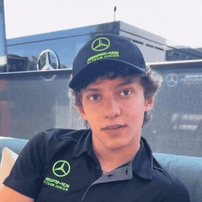 Young Man In Mercedes AMG Hat And Shirt GIF