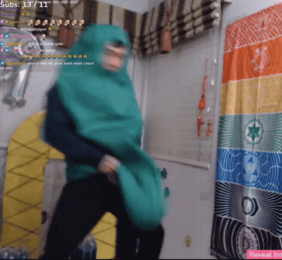 Young Man In Miami Heat Sweatshirt Covering Nose GIF