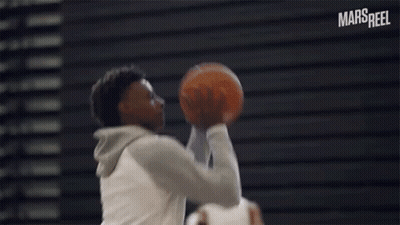 Young Man In Nike Hoodie Looking Up GIF