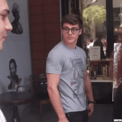 Young Man In Ninja T-Shirt GIF
