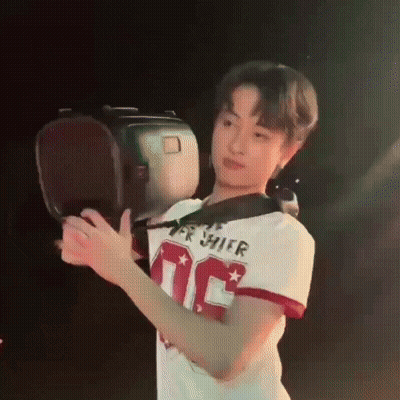 Young Man In Number 10 Jersey Holding Boxing Glove GIF