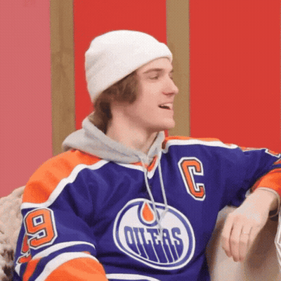 Young Man In Oilers Jersey And White Beanie GIF