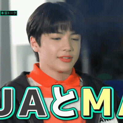 Young Man In Orange And White Striped Shirt Saying Ja & M GIF
