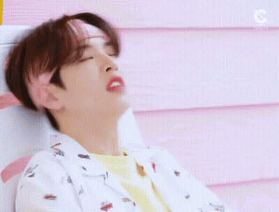 Young Man In Pink Headband And Yellow Shirt GIF