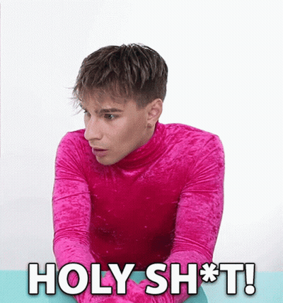 Young Man In Pink Turtleneck Says Holy Shit GIF