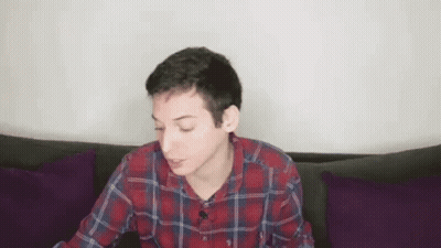 Young Man In Plaid Shirt Drinking Red Cup GIF