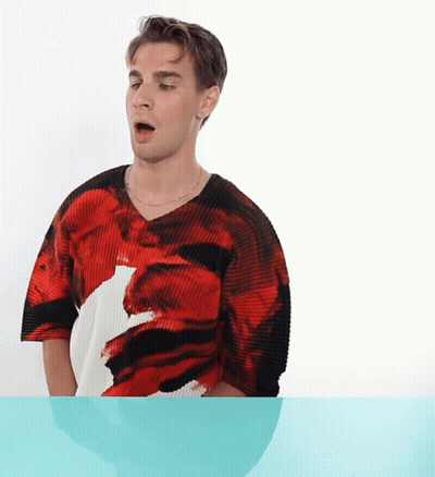 Young Man In Red And Black Shirt With Canadian Flag GIF