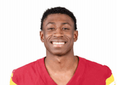 Young Man In Red And Yellow Jersey Smiling GIF
