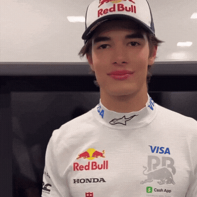 Young Man In Red Bull Hat And White Shirt GIF