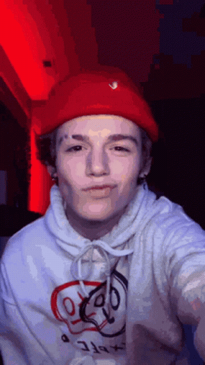Young Man In Red Hat And White Hoodie GIF