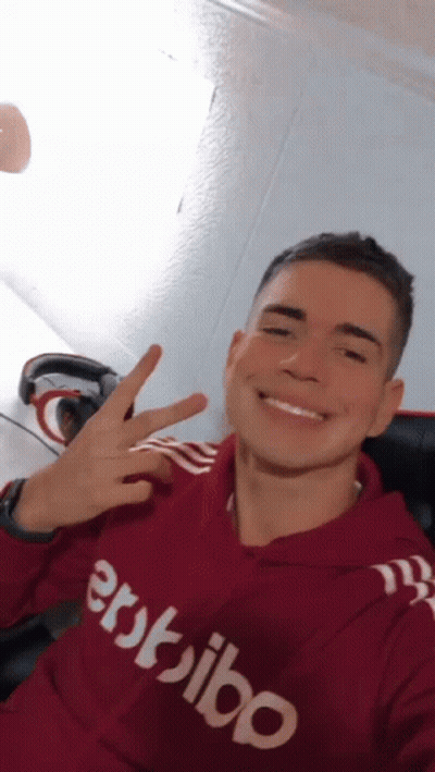 Young Man In Red Hoodie Saying Erdibo GIF