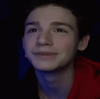Young Man In Red Hoodie With Earrings GIF
