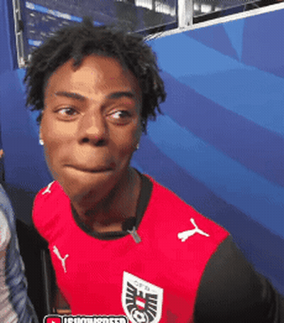 Young Man In Red Puma Shirt Making Face GIF