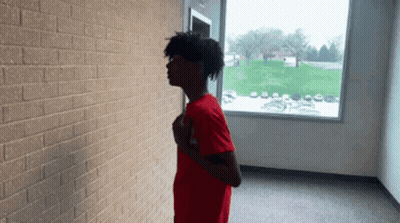 Young Man In Red Shirt GIF