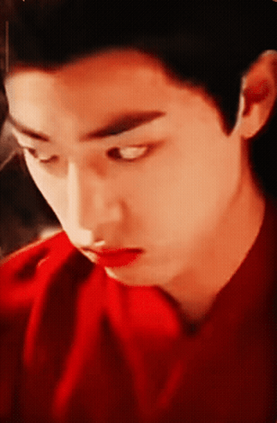 Young Man In Red Shirt Close Up GIF
