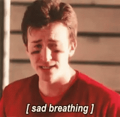 Young Man In Red Shirt Crying Sad Breathing GIF