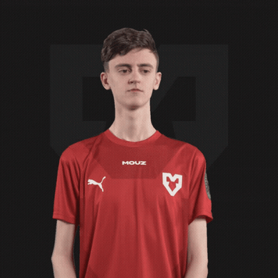 Young Man in Red Shirt Saying Mouz