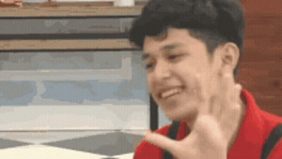 Young Man In Red Shirt Smiling Peace Sign GIF