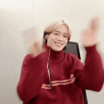 Young Man In Red Sweater Making Funny Face GIF