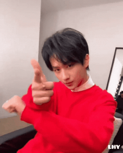 Young Man In Red Sweater Pointing At Camera GIF
