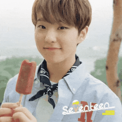 Young Man In Seventeen Shirt Holding Popsicle GIF