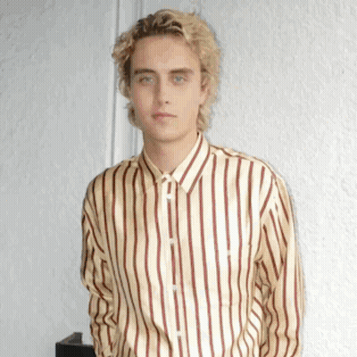 Young Man In Striped Shirt GIF
