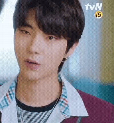 Young Man In Striped Shirt Close Up GIF