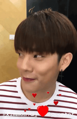 Young Man In Striped Shirt With Red Heart GIF