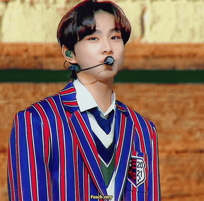Young Man In Striped Suit With Number 20 GIF