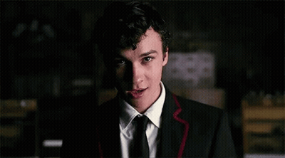 Young Man In Suit And Tie Smiling GIF