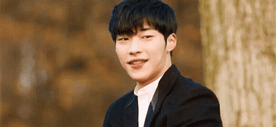 Young Man In Suit And Tie Smiling GIF