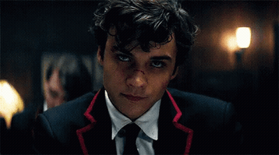 Young Man In Suit And Tie With Bloody Nose GIF