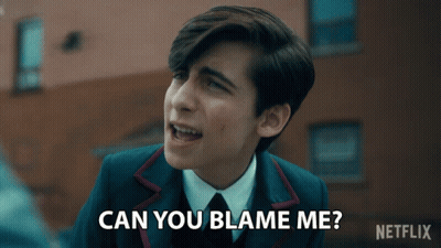 Young Man in Suit Asking Can You Blame Me