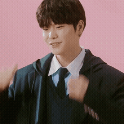 Young Man In Suit Giving Thumbs Up GIF