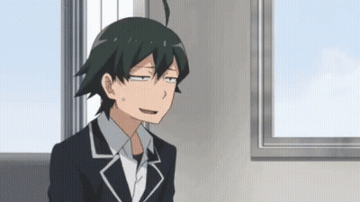 Young Man In Suit Sitting In Front Of Window GIF