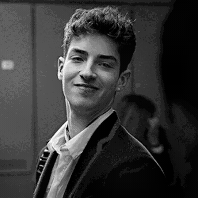 Young Man In Suit Smiling GIF