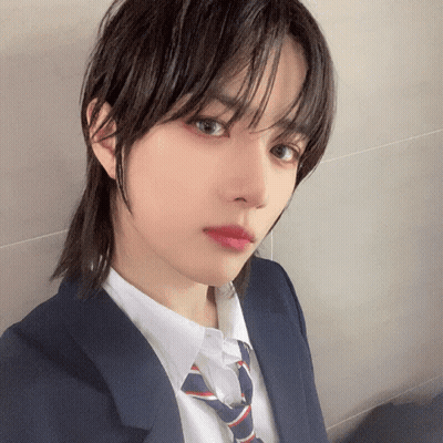 Young Man In Suit Taking Selfie GIF