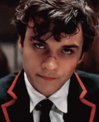 Young Man In Suit With Red Striped Tie GIF