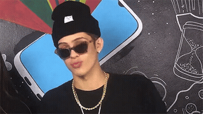 Young Man In Sunglasses And Beanie Making Funny Face GIF