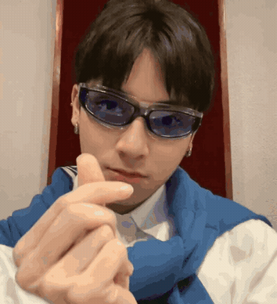 Young Man In Sunglasses Making Heart GIF