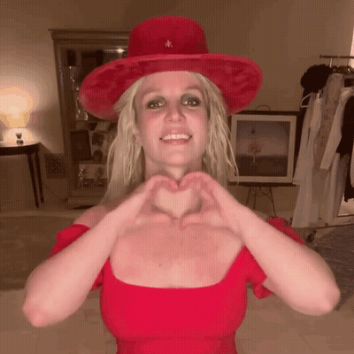 Young Man In Sunglasses Making Heart Shape GIF