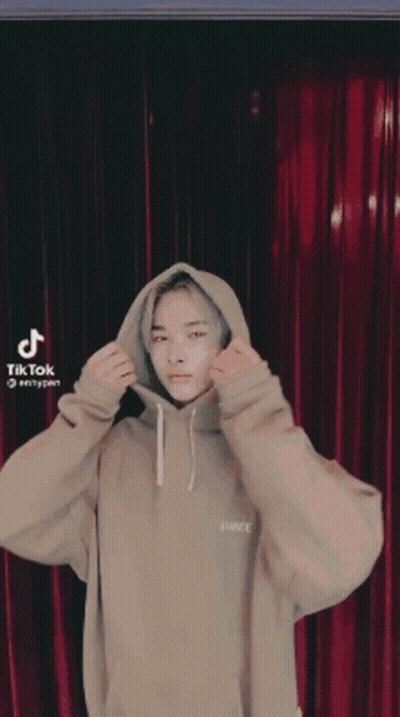 Young Man In Tan Hoodie Saying Space GIF
