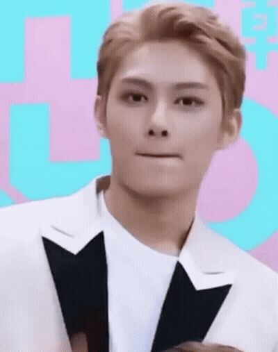 Young Man In Tuxedo Making Funny Face GIF